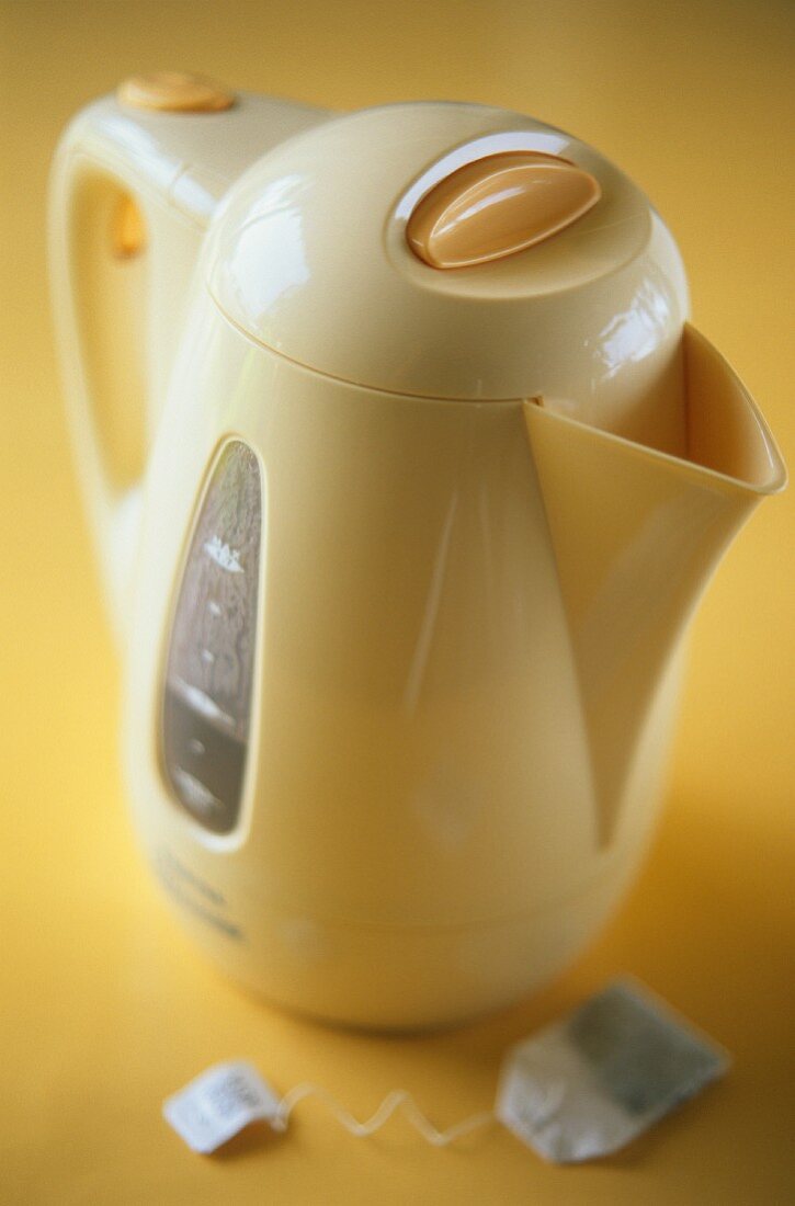 Yellow water boiler with tea bag