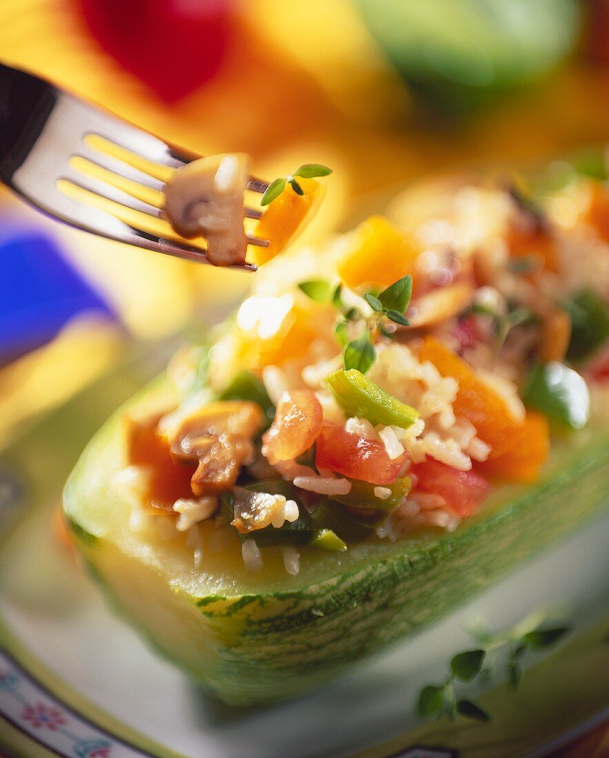 Stuffed courgettes with rice, tomatoes and peppers