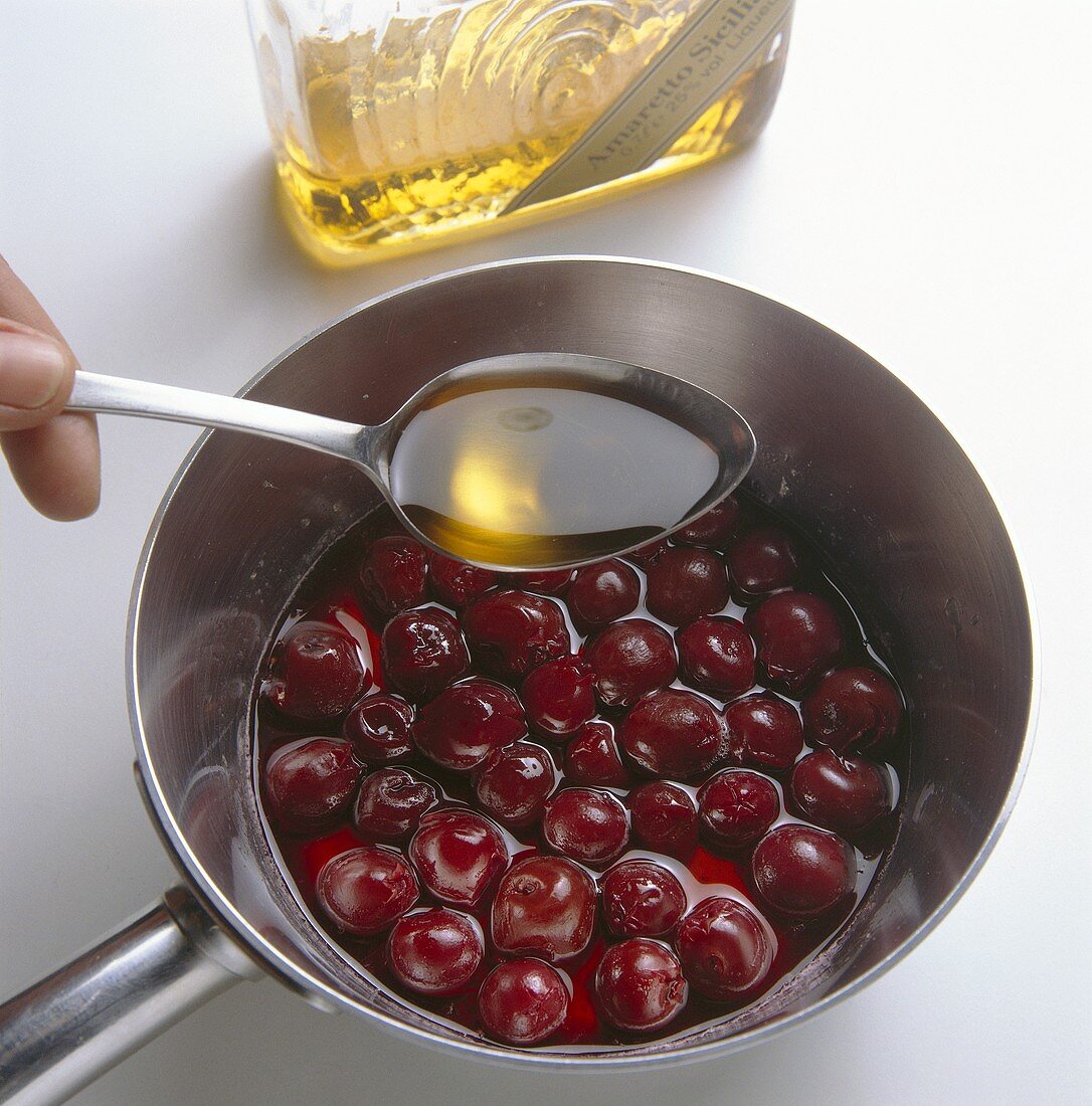 Preparing amaretto cherries