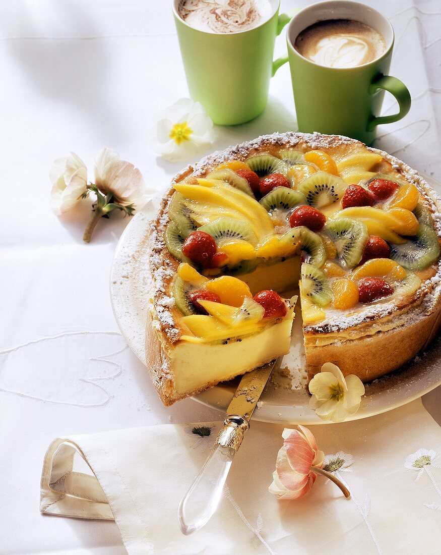 Baked cheesecake with fruit; coffee