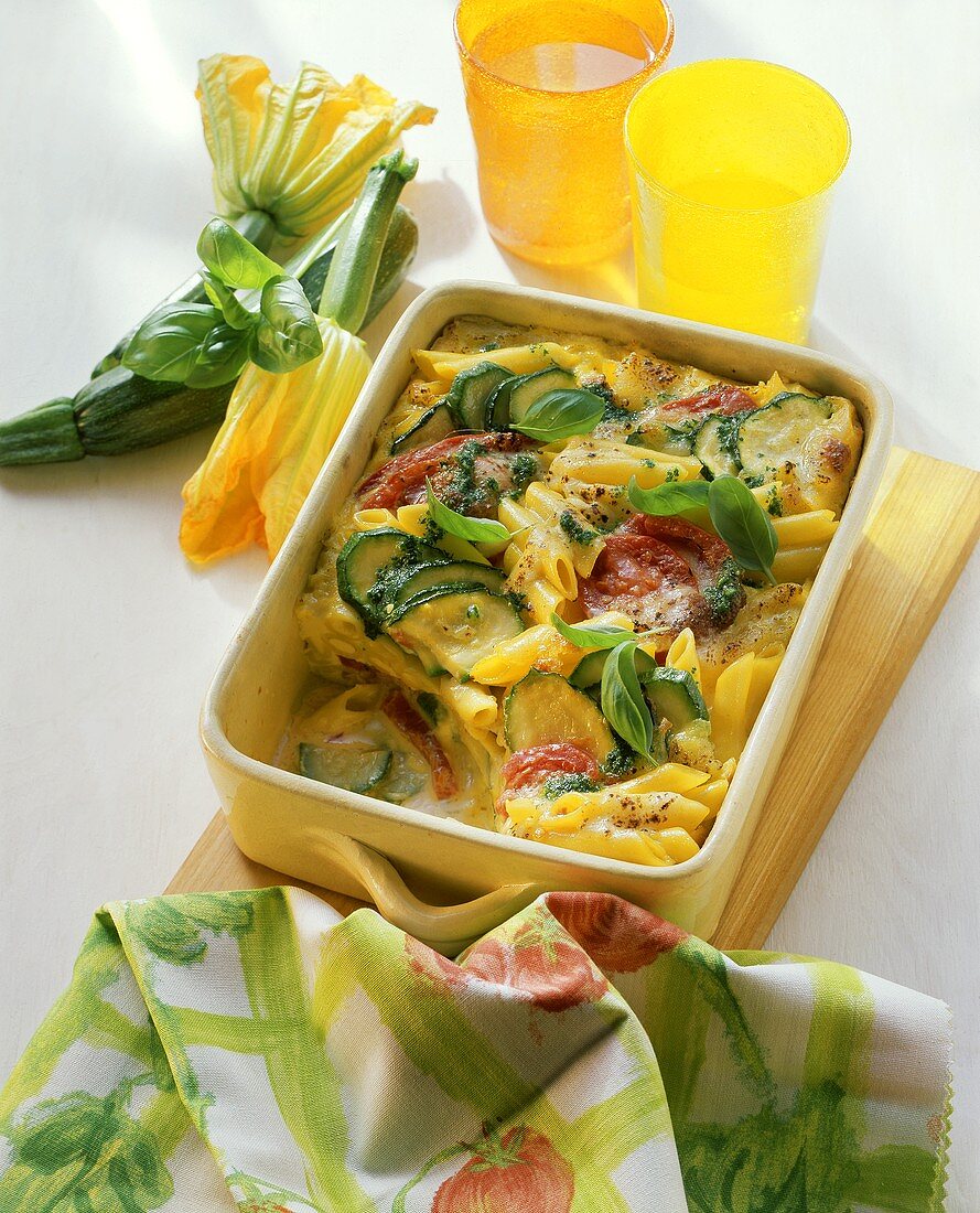 Penne bake with courgettes, tomatoes and basil