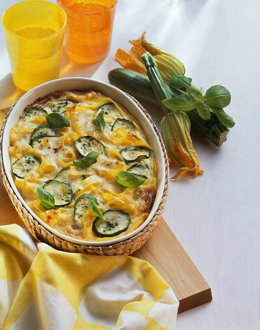 Ribbon pasta bake with courgettes, tomatoes and basil