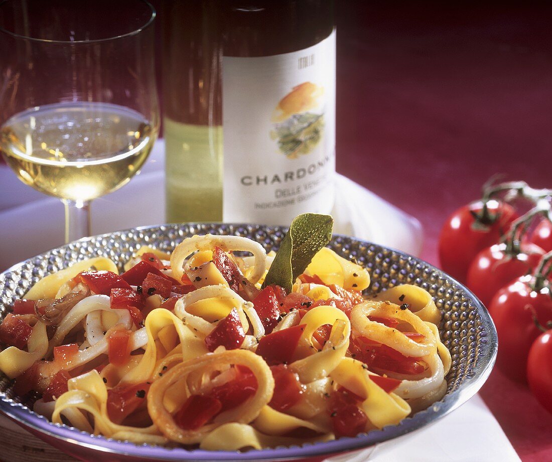 Tagliatelle with cuttlefish, peppers and tomatoes