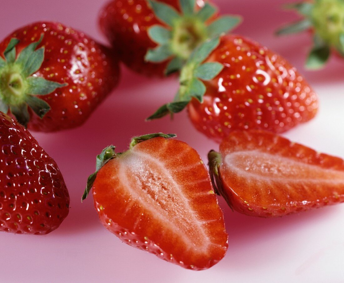 Strawberries, one halved