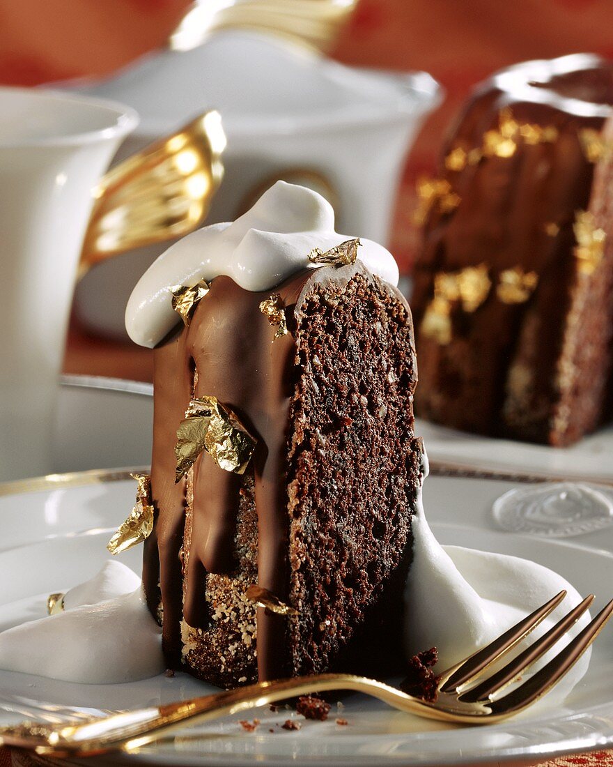 Mohr im Hemd (Austrian dessert)  on gold-rimmed plate  