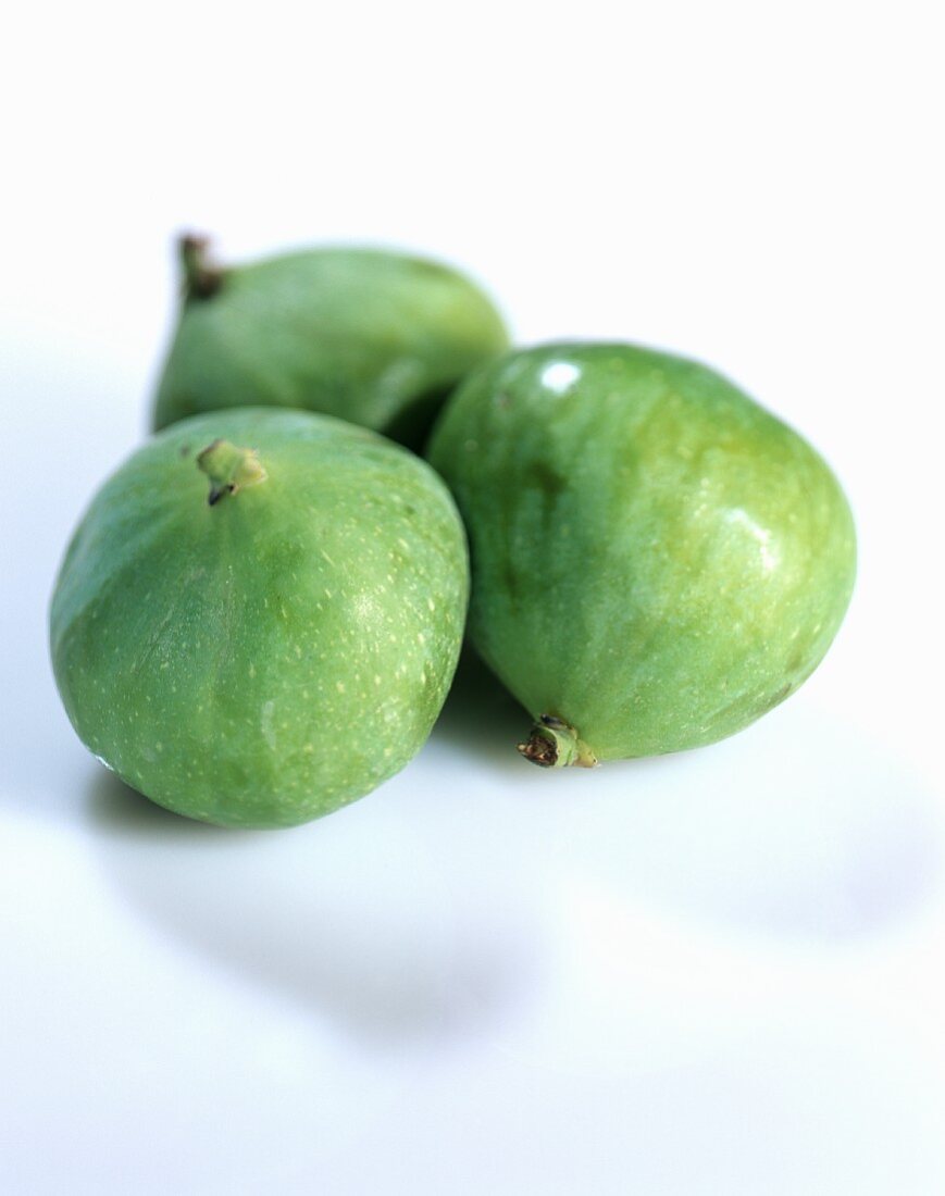 Three fresh green figs