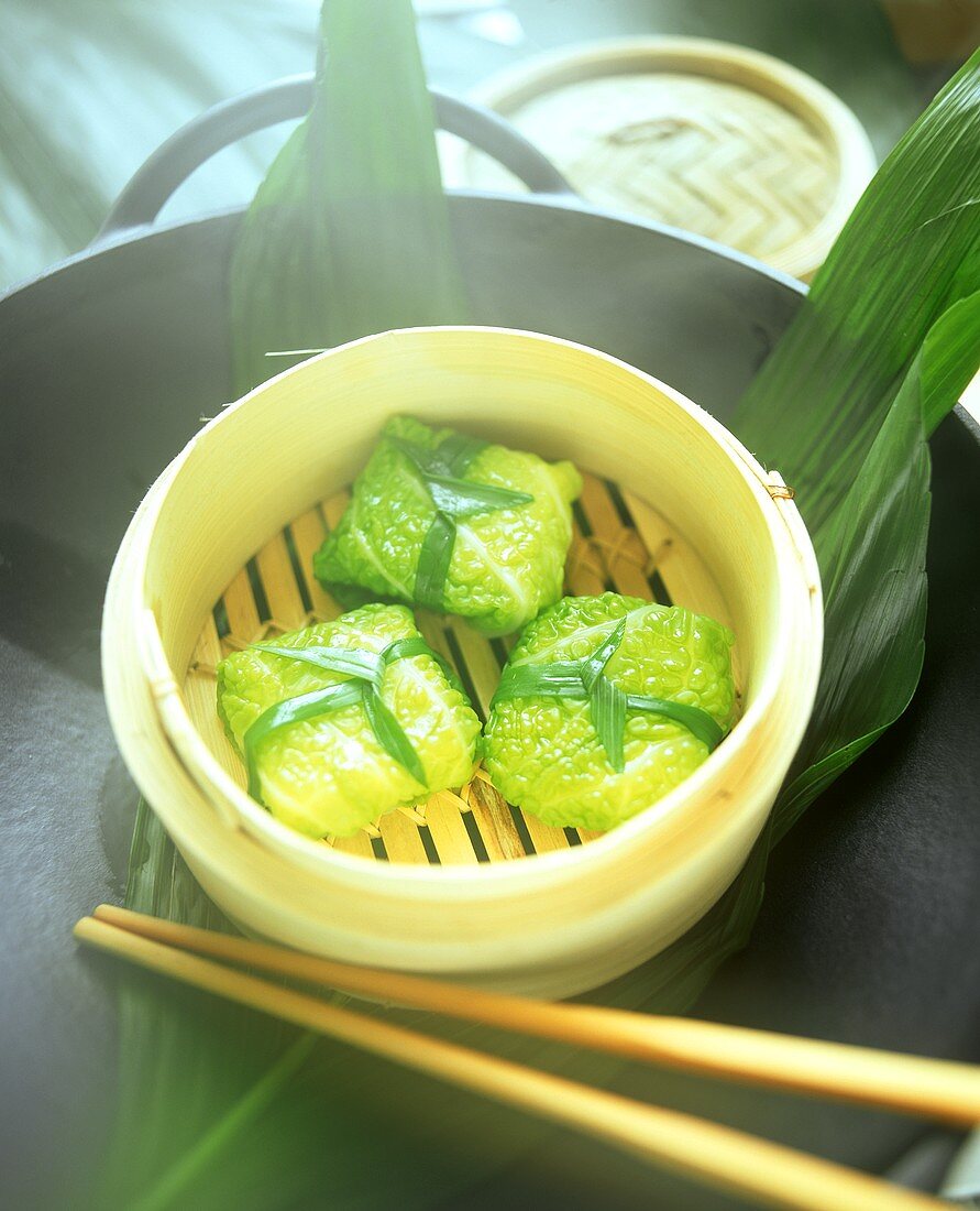 Savoy parcels in bamboo steamer