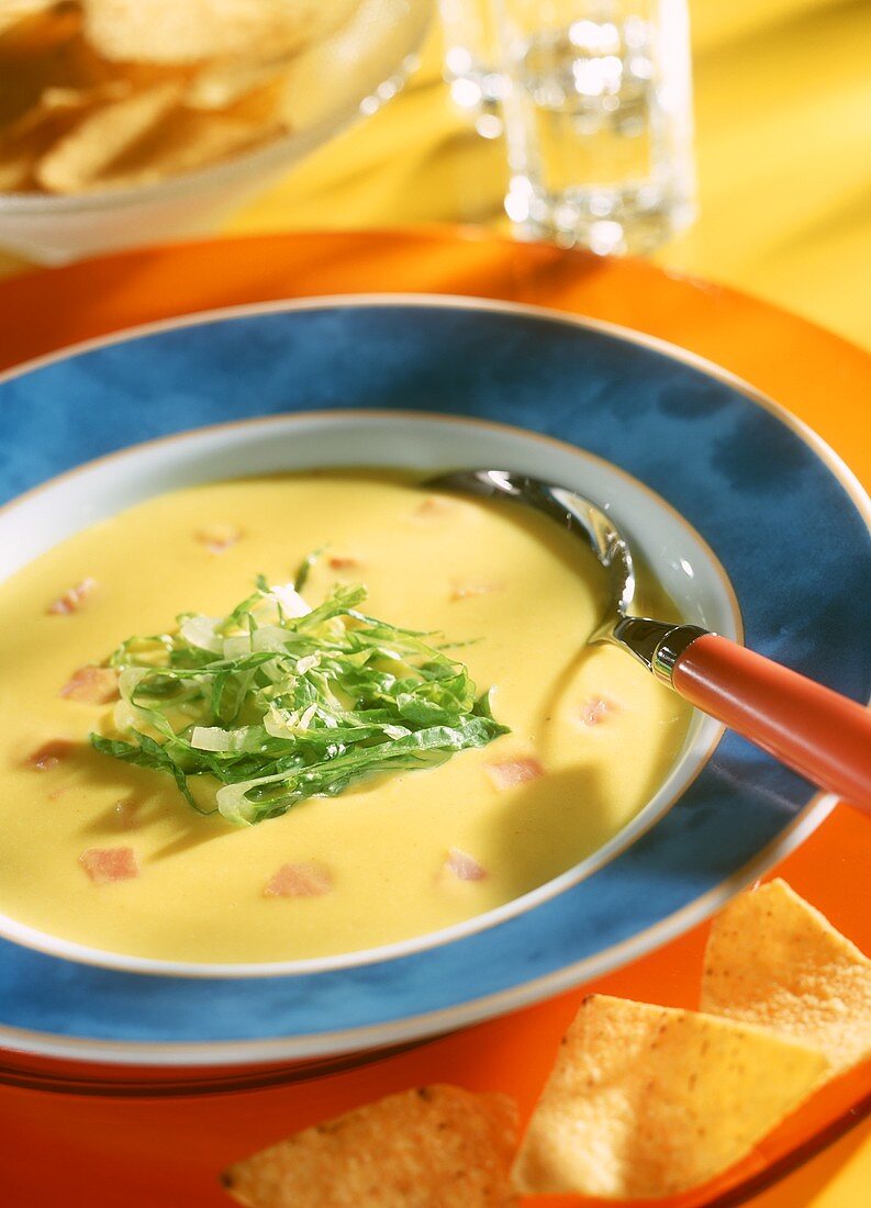 Cream of sweet corn soup with lettuce strips & diced ham