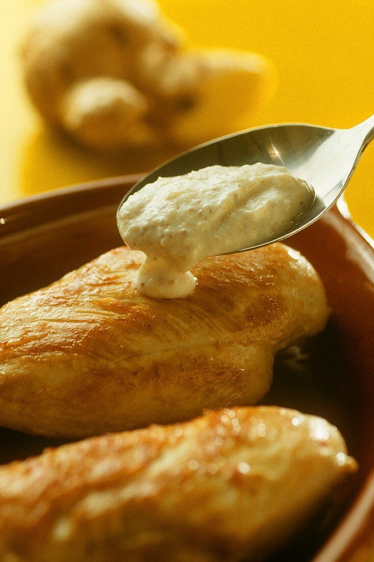 Chicken breast with ginger yoghurt mousse in baking dish