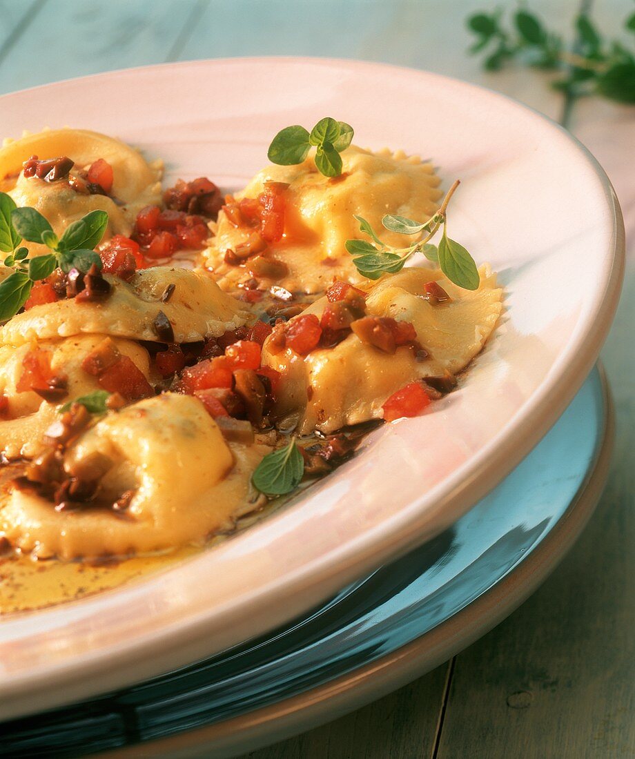 Ravioli alla senese (Ricotta ravioli with olive vinaigrette)