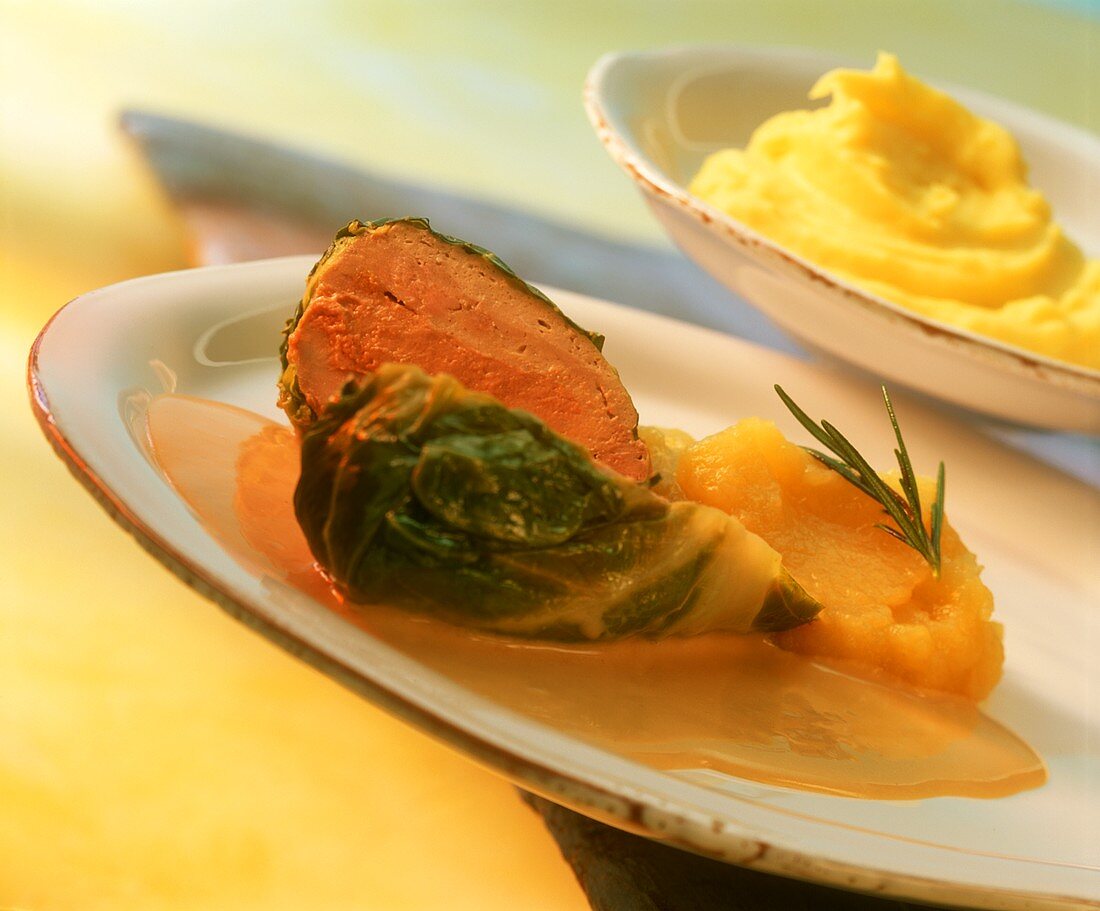 Pheasant breast in cabbage with apple and rosemary puree