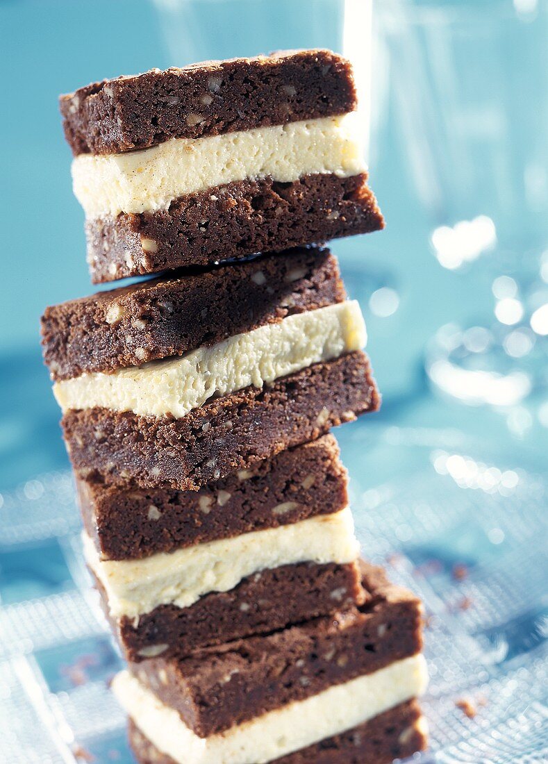 A pile of cappuccino brownie sandwiches
