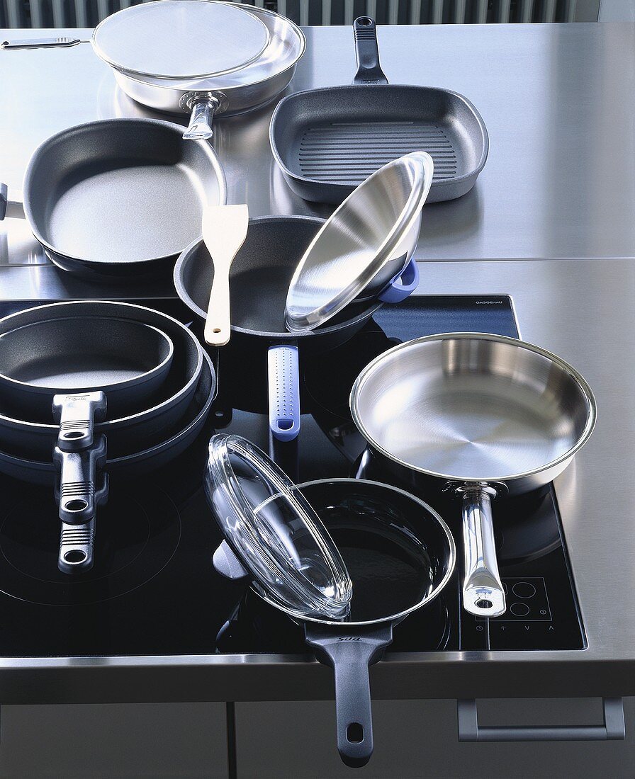 Various frying pans and a grill pan