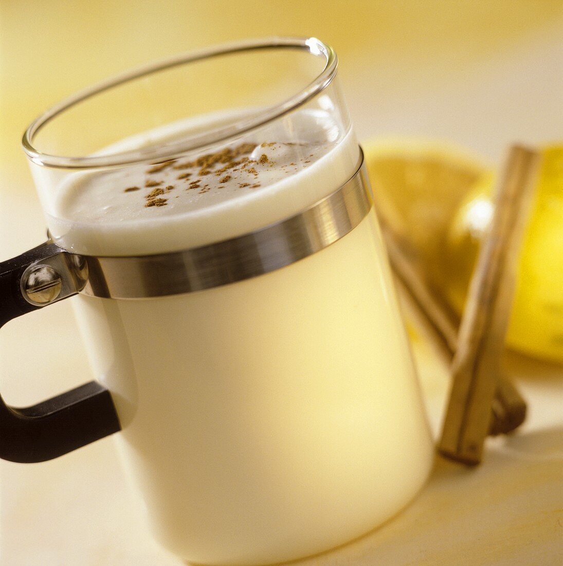 Hot advocaat drink with cinnamon