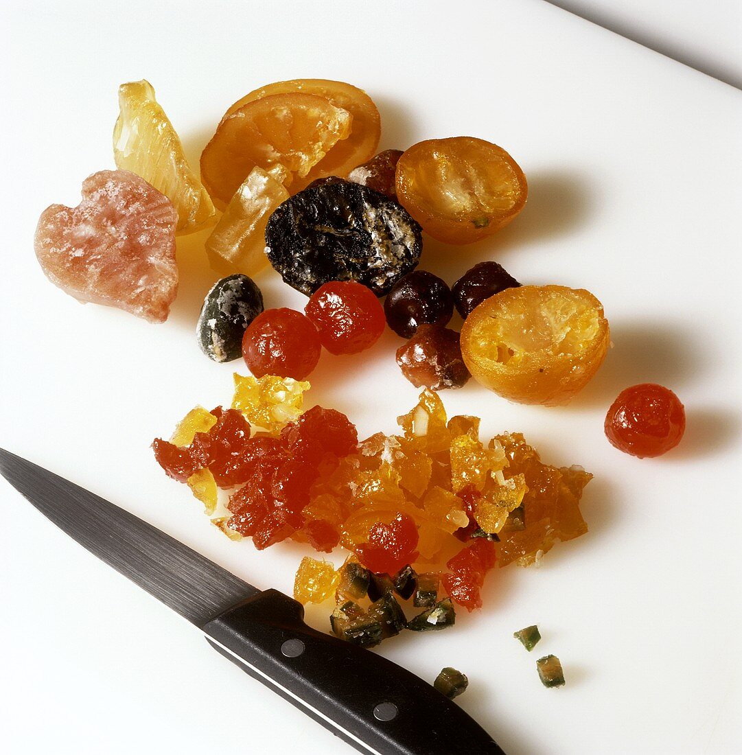 Finely chopping mixed candied fruits