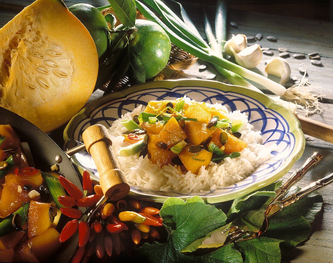 Caramelised diced pumpkin with spring onions on rice