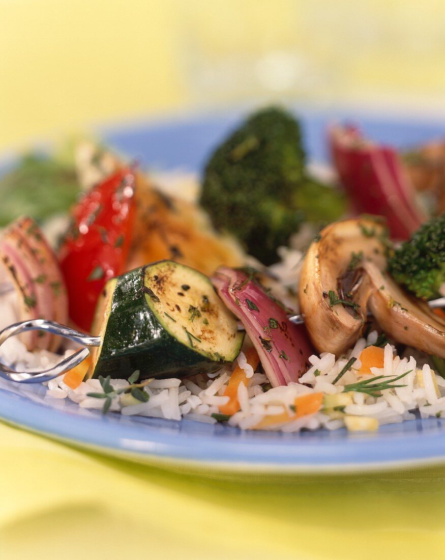 Vegetable kebabs on vegetable rice