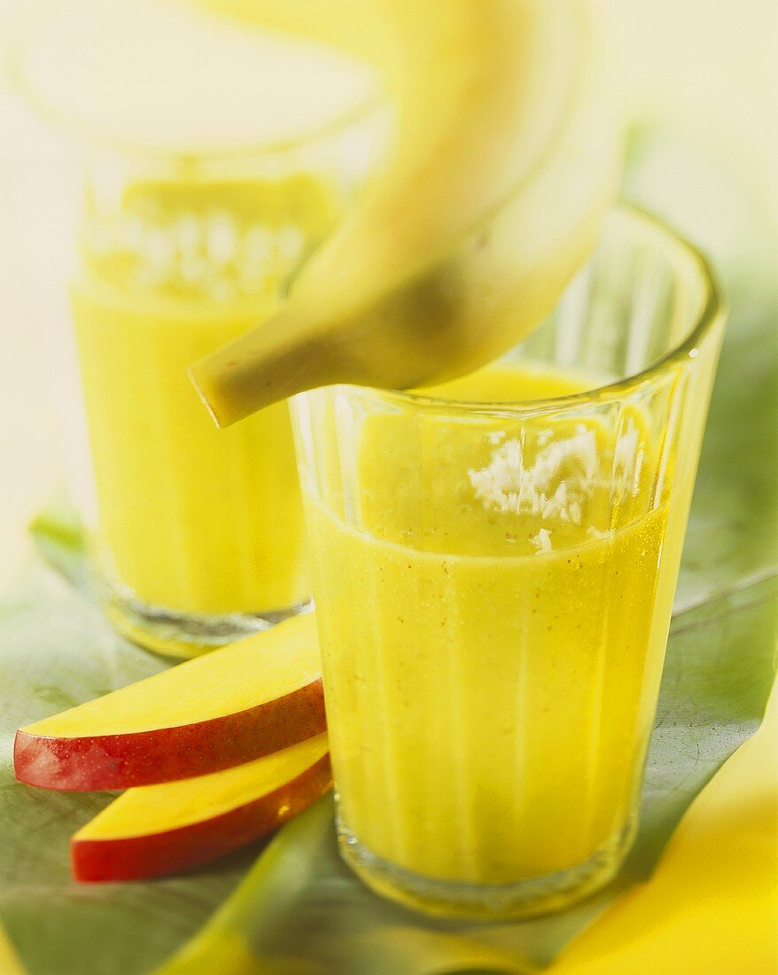 Banana drink with kiwi fruit and grated coconut