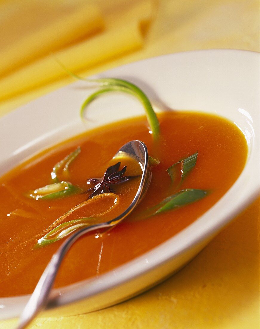 Carrot soup with ginger, spring onions and star anise