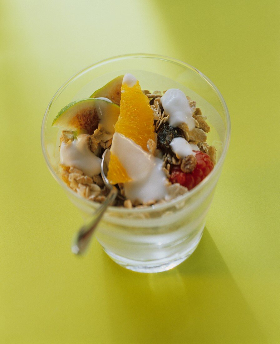 Muesli with fruit in glass