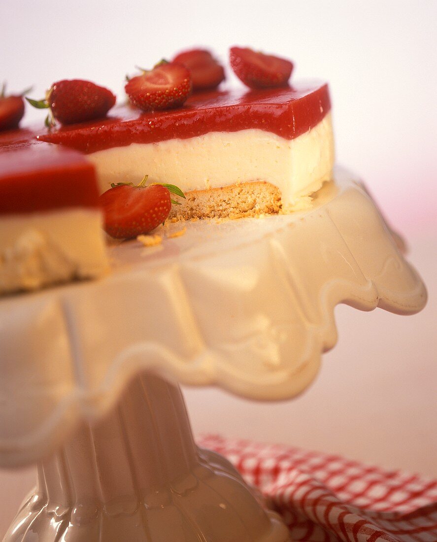 Strawberry yoghurt cake on cake plate
