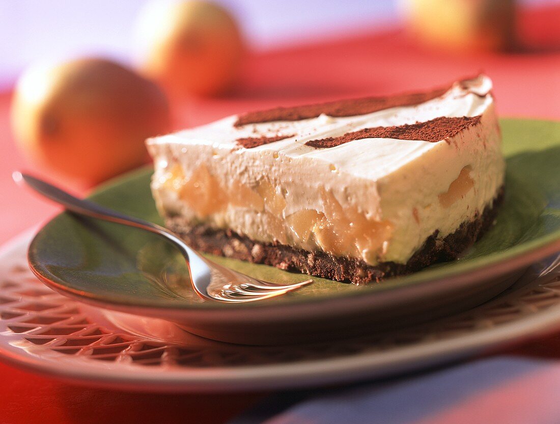 Piece of pear cheesecake with cocoa stripes