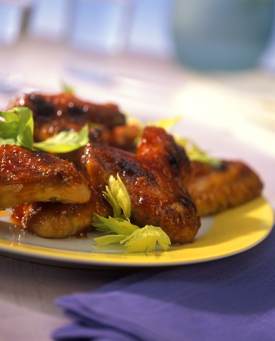 Chicken wings with celery leaves