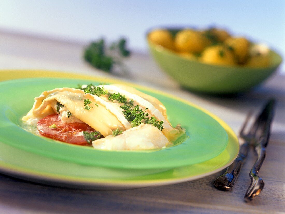 Camembert-Kabeljau-Auflauf mit Tomaten