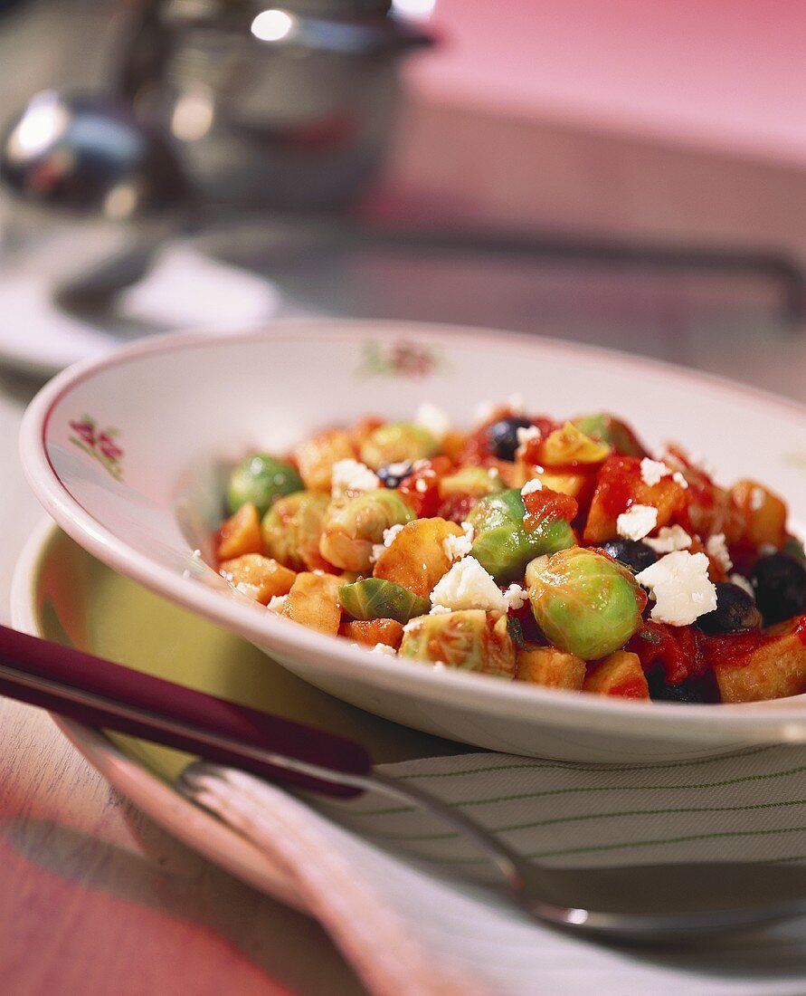 Brussels sprout and potato goulash with sheep's cheese