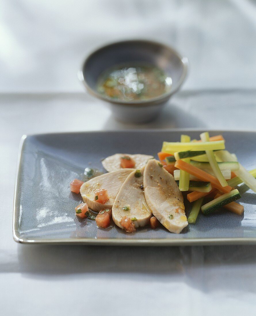 Poached chicken breast with vegetable vinaigrette