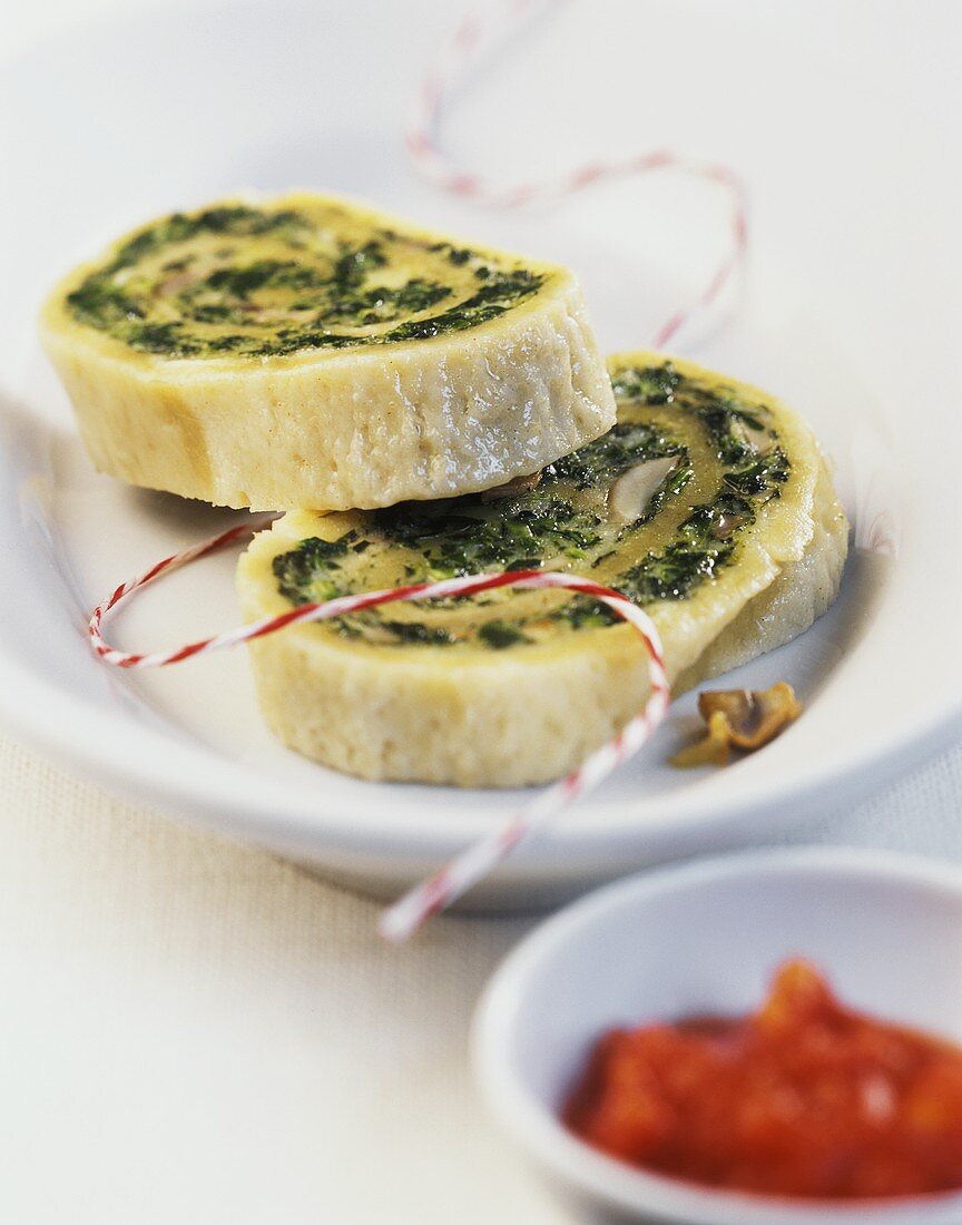 Cheese and vegetable roulade with chard and mushrooms