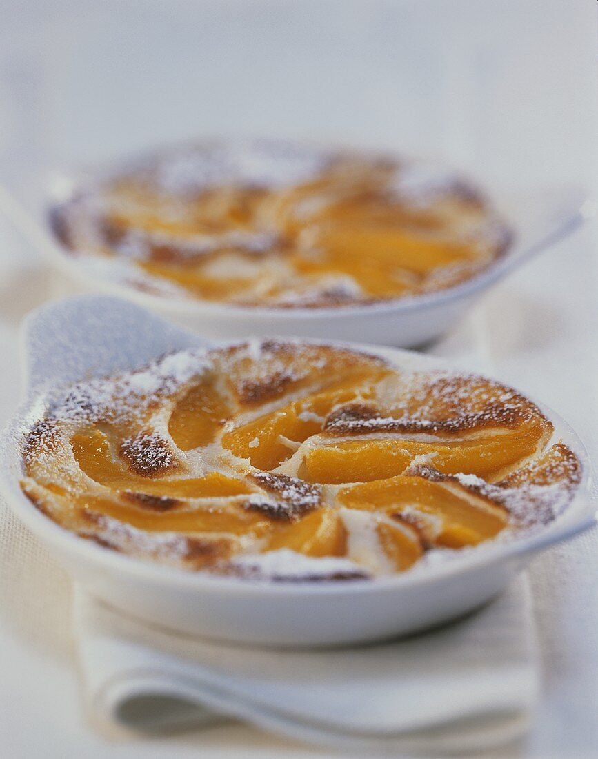 Peach brulee with icing sugar