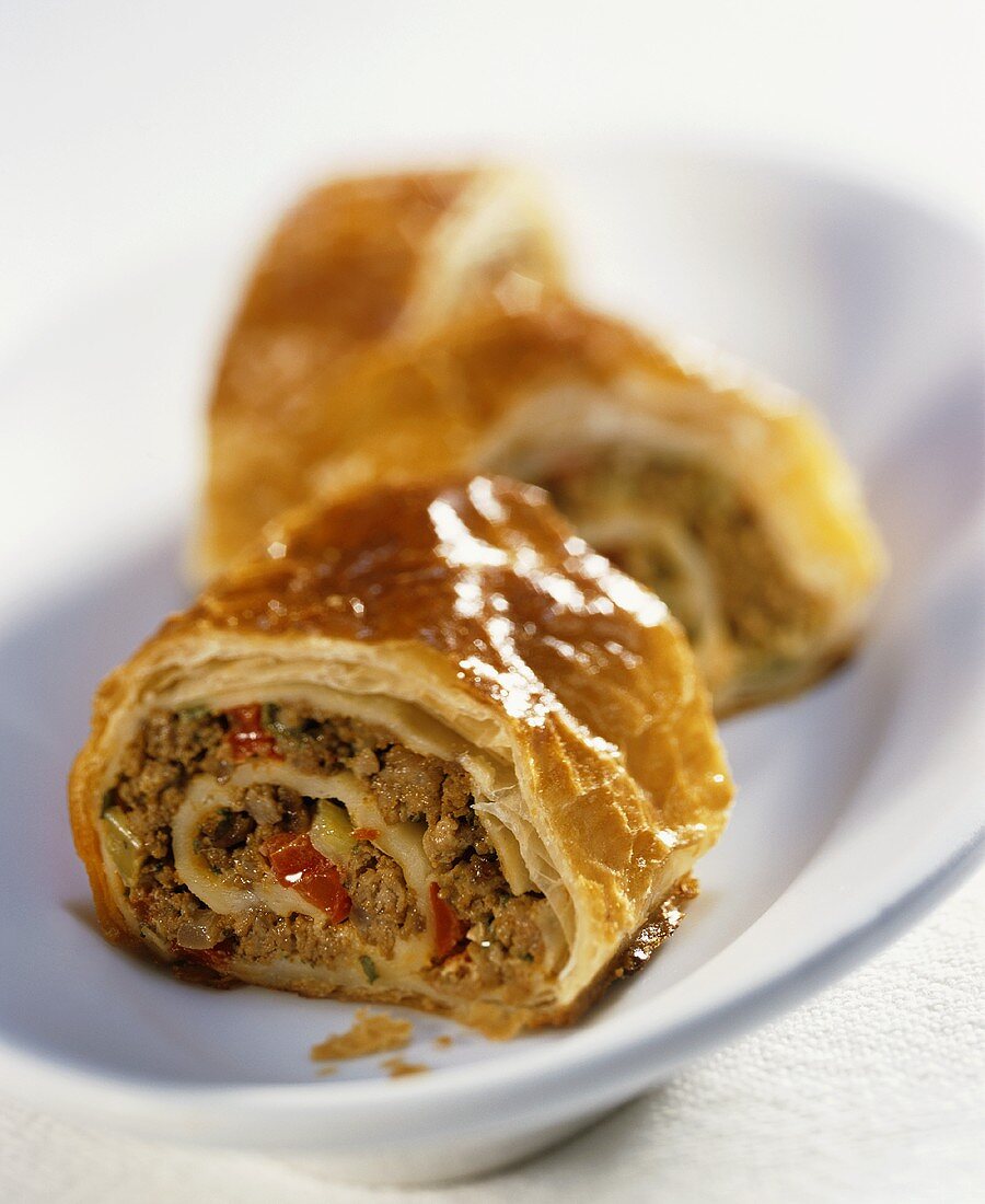 Puff pastry rolls with mince and pepper filling