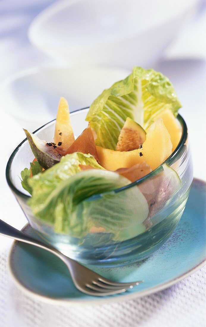 Melon and fig salad with Parma ham and romaine lettuce