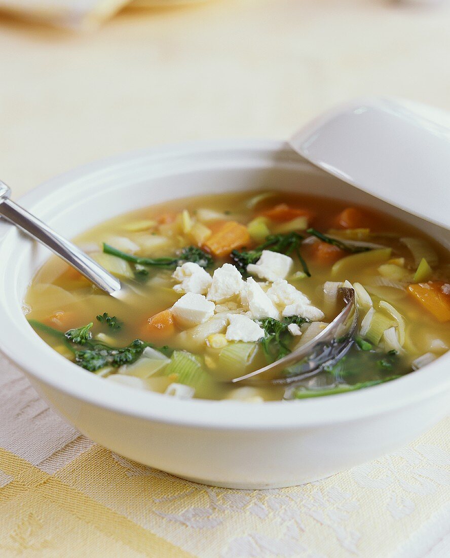 Vegetable soup with sheep's cheese
