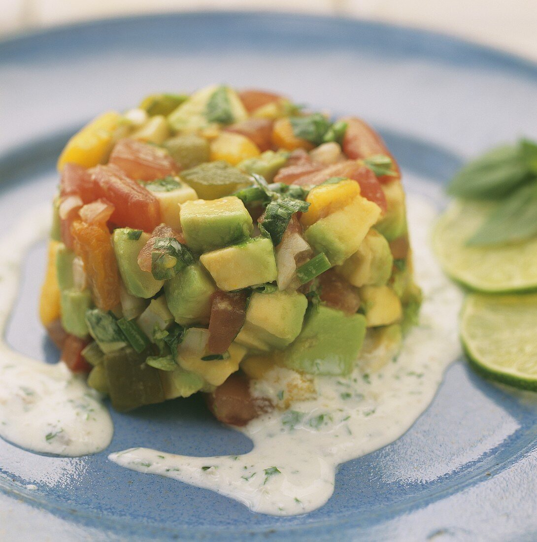 Tomato and avocado tartare with herb sauce