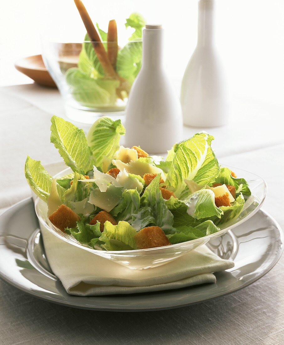 Caesar salad on glass plate