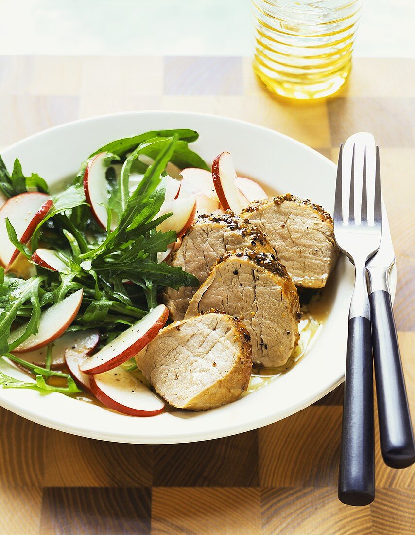 Pork fillet with rocket and apple salad