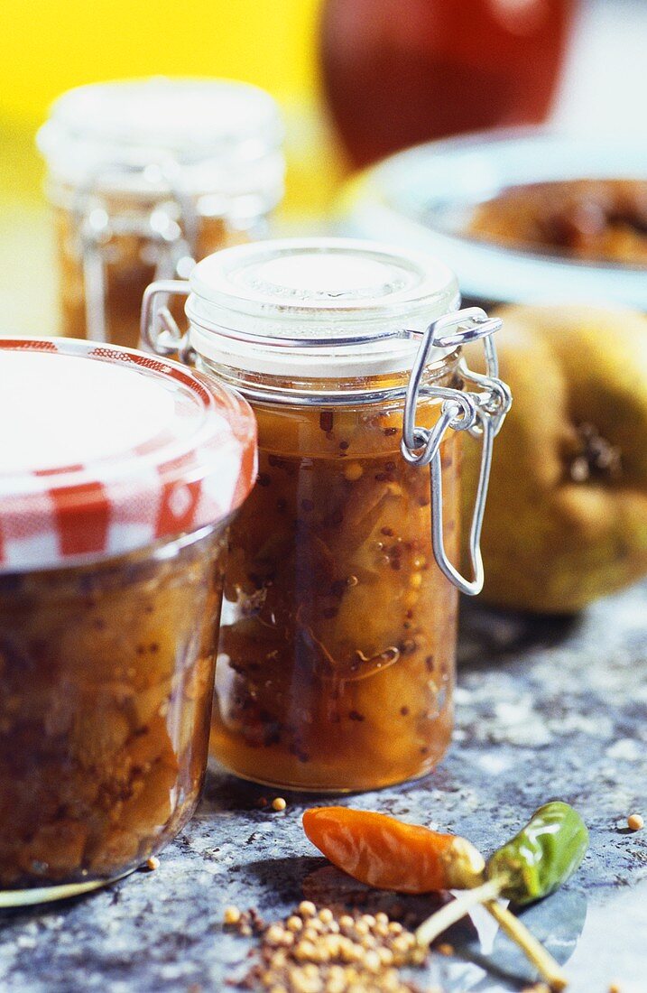 Apple and pear chutney in jars