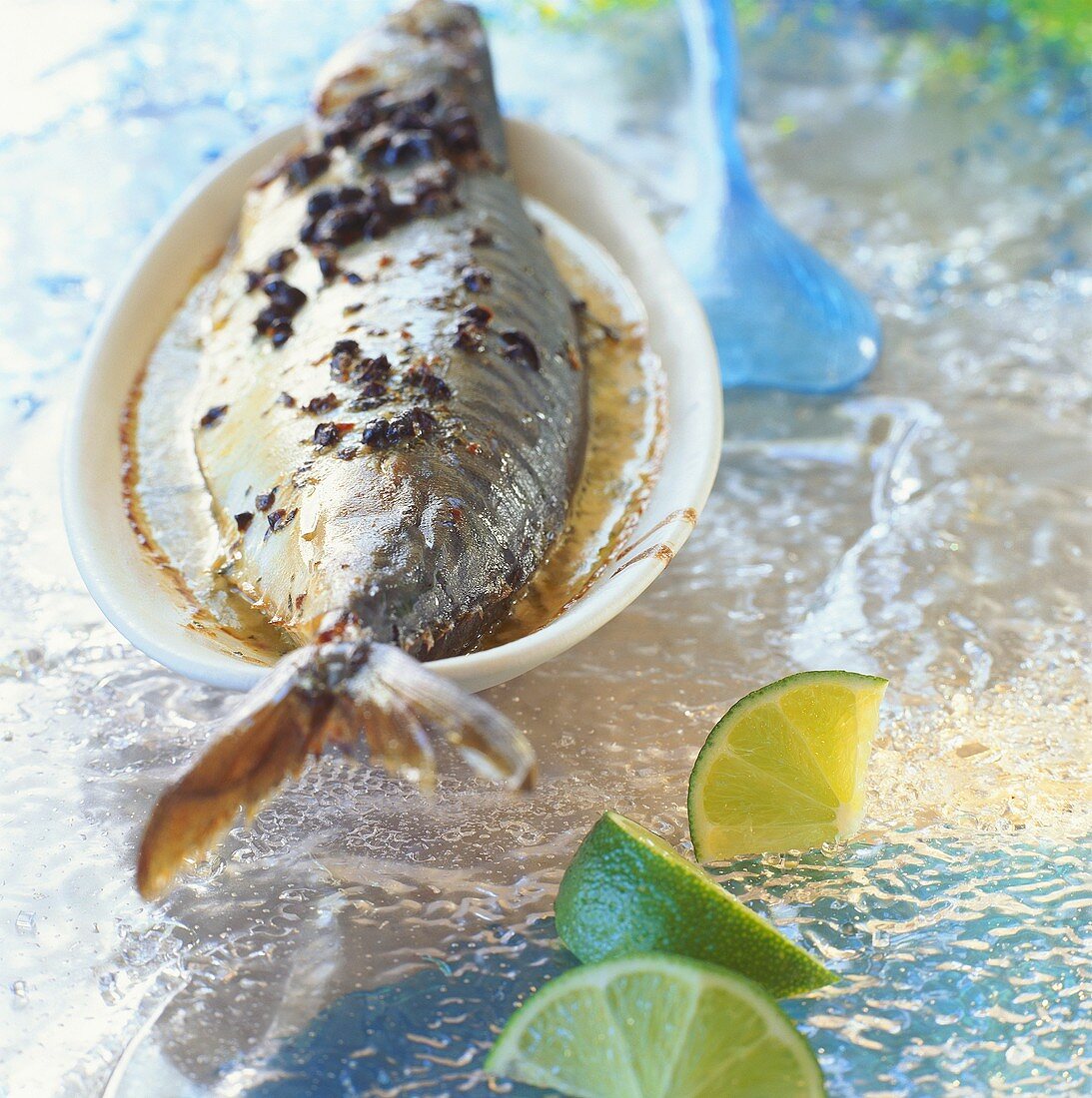 Mackerel with coconut milk and lime slices