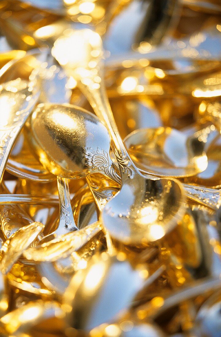 Many golden spoons (filling the picture)