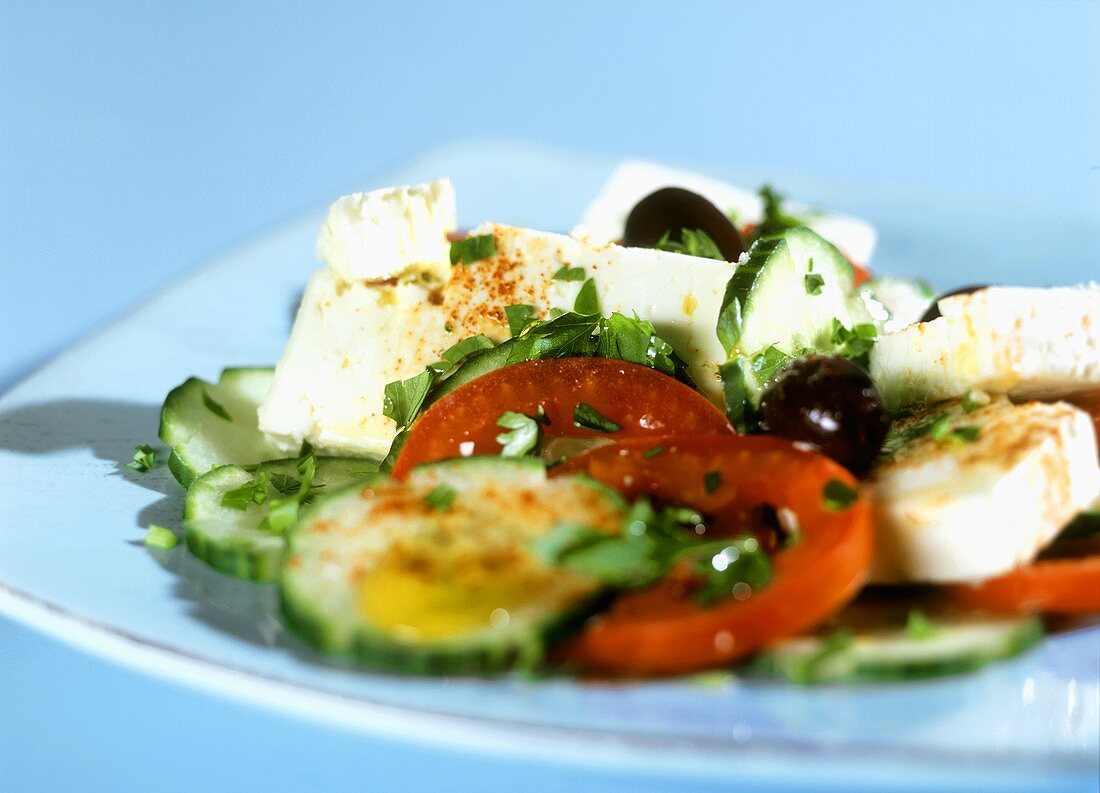 Turkish sheep's cheese platter with cucumber, tomatoes & olives