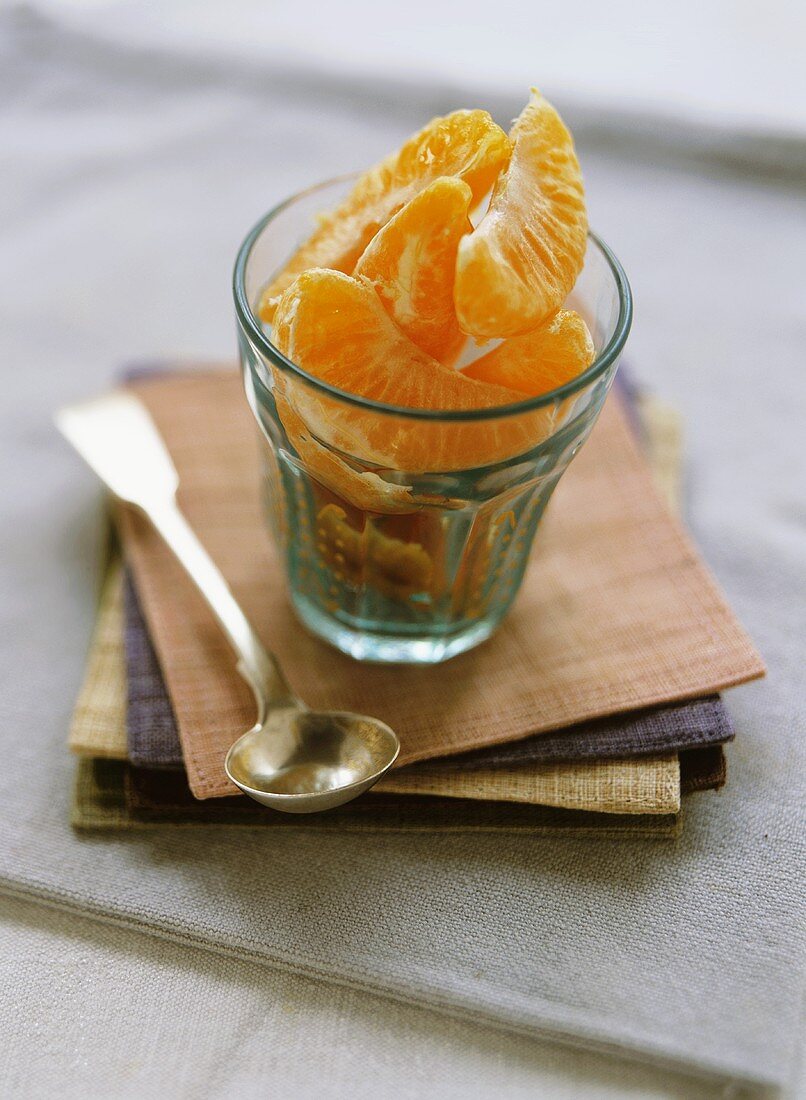 Orange wedges in a glass