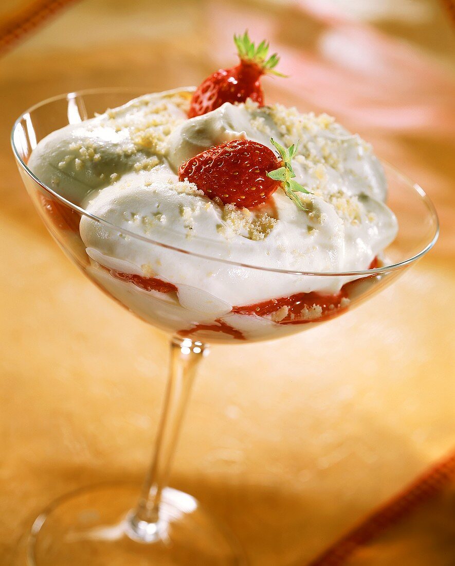 Strawberries with cream mousse in dessert bowl