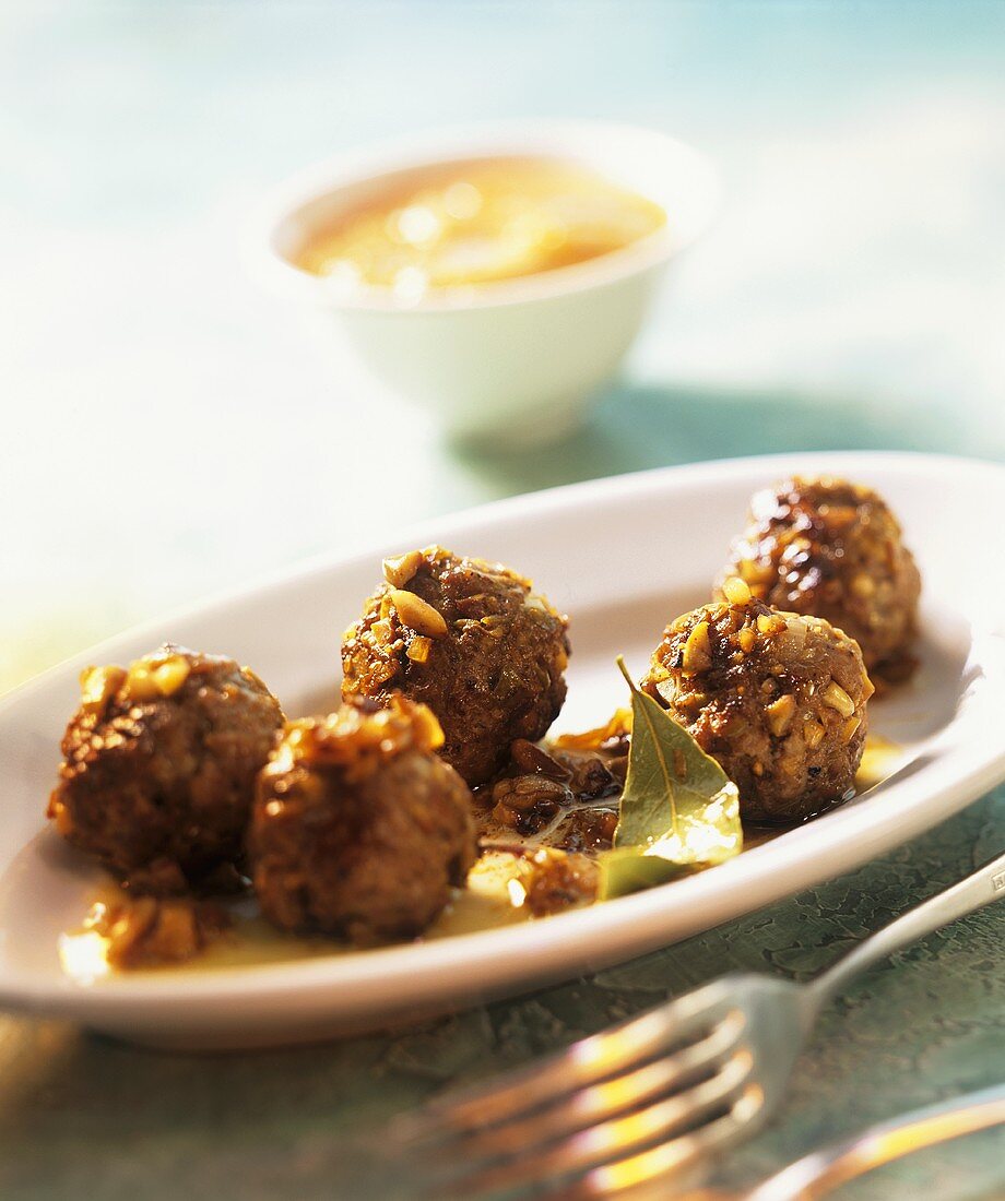 Spanish meatballs with sherry sauce and bay leaf