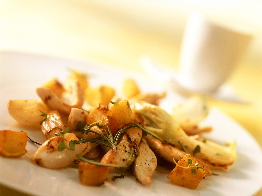 Rabbit with potatoes and rosemary, from the wok