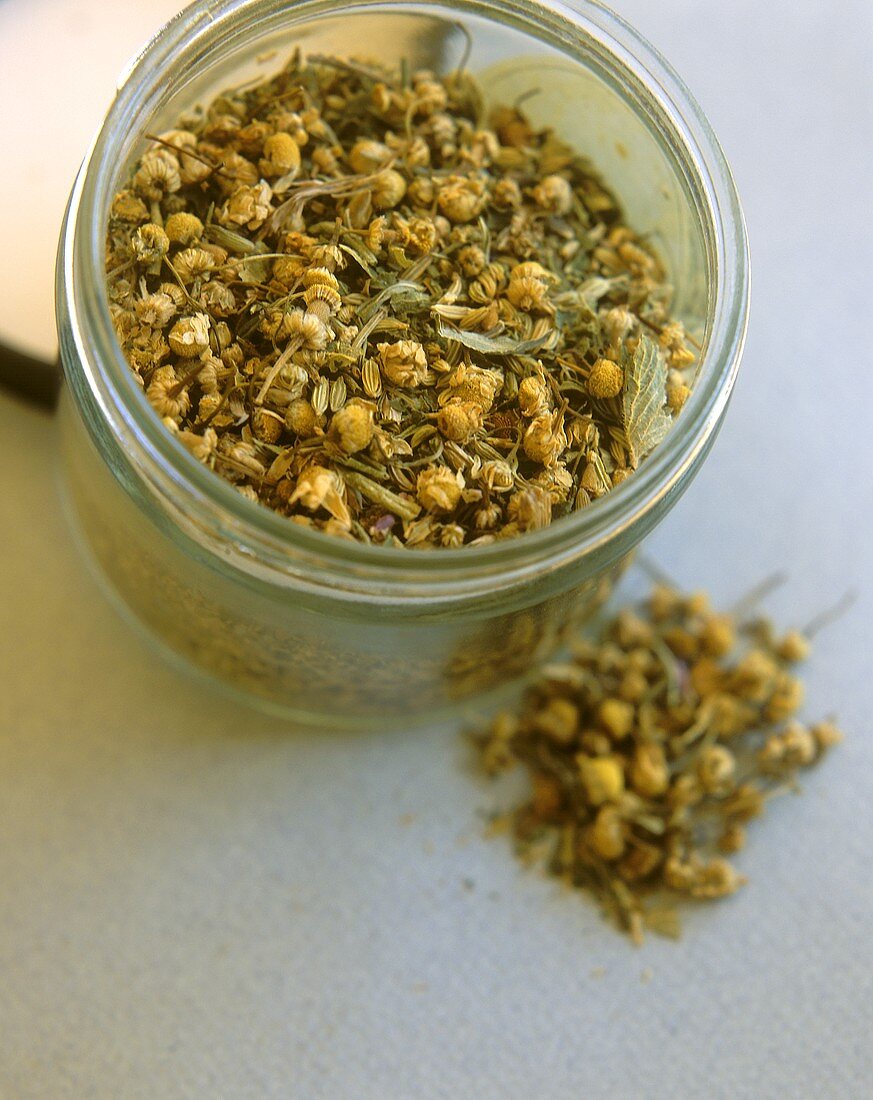 Dry camomile tea in jar