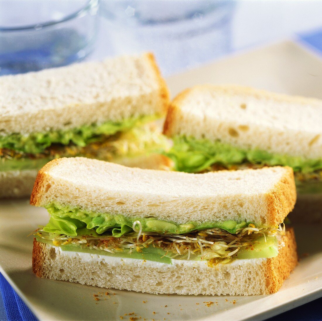 Sandwiches with cucumber and sprouts