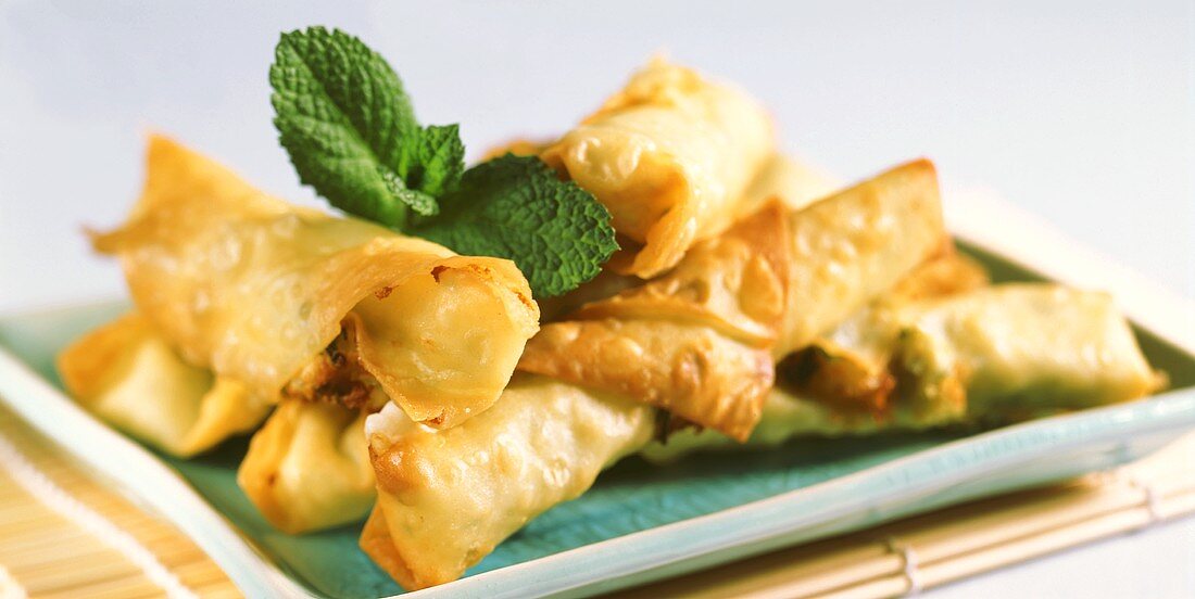 Deep-fried yufka pastry rolls with cheese filling