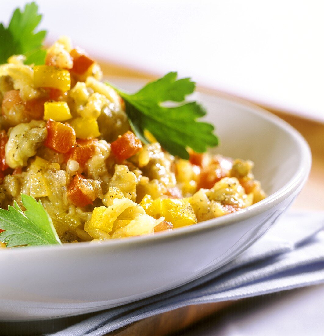 Mashed aubergine with peppers and parsley